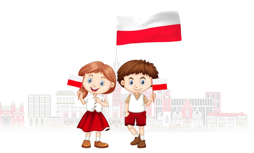 Dziewczynka z chłopcem trzymają biało-czerwone chorągiewki